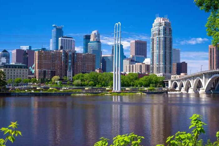photo of Minneapolis downtown during mid day with clear blue sky